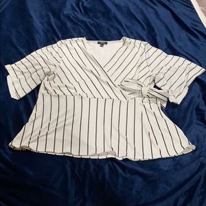 Women’s black and white striped blouse￼